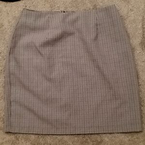 Cute black and white plaid skirt.